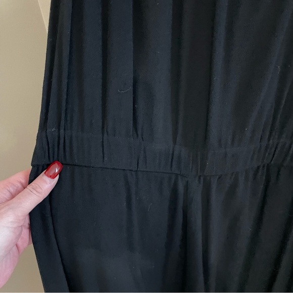 Melissa Nepton black off shoulder jumpsuit with flutter sleeves and tulip legs. - Picture 5 of 9